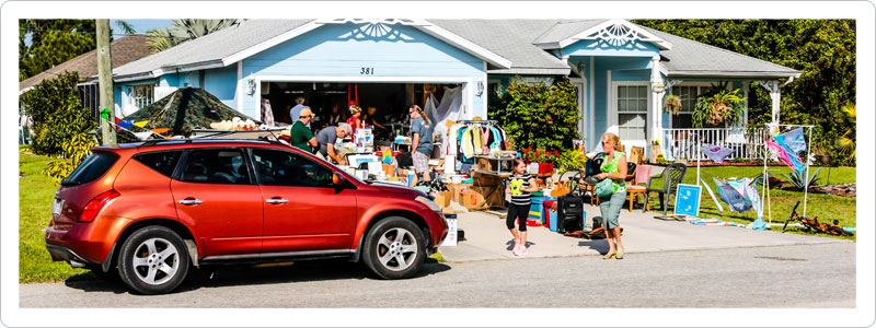 Neighbors visiting a garage sale