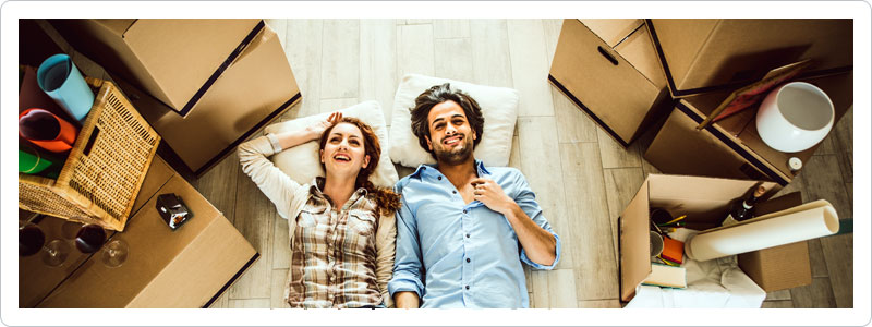 Couple deciding whether to keep, store or sell their items before moving