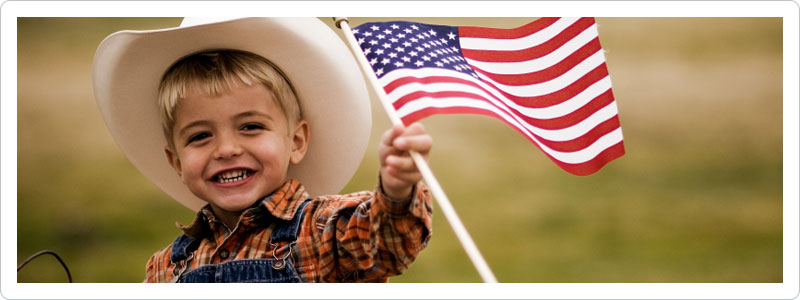 Little boy waving American flag