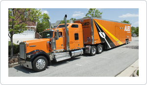 Berger Allied moving truck in front of residence